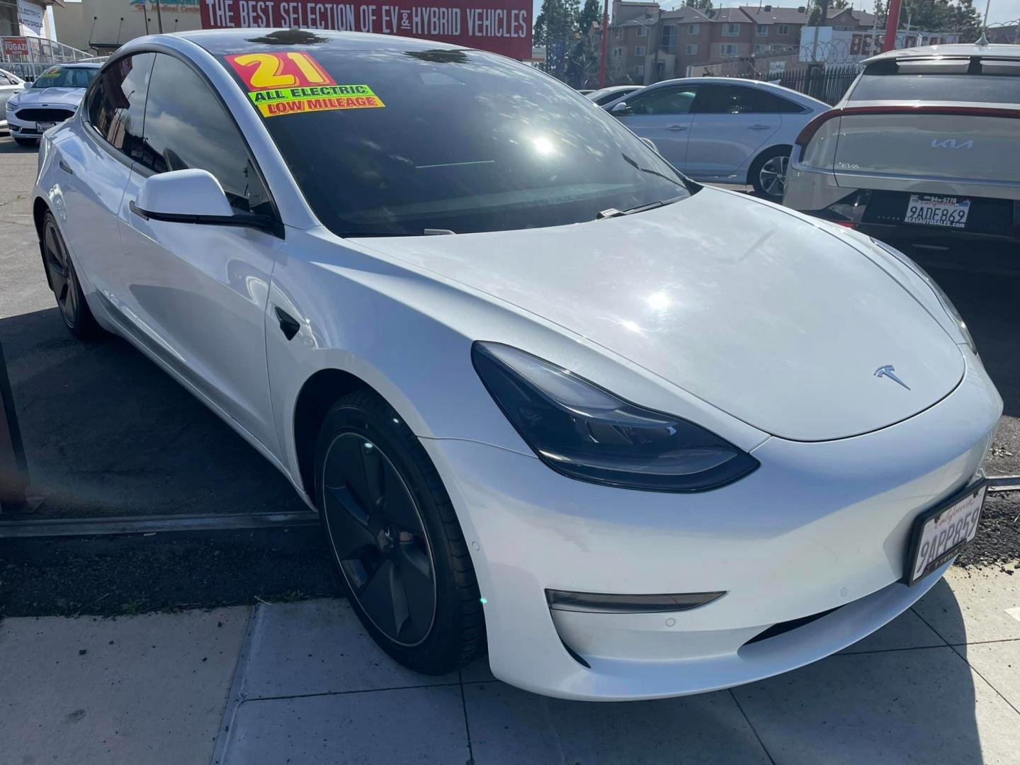 2021 WHITE /BLACK Tesla Model 3 Long Range (5YJ3E1EB8MF) with an ELECTRIC engine, 1A transmission, located at 744 E Miner Ave, Stockton, CA, 95202, (209) 944-5770, 37.956863, -121.282082 - Photo#0